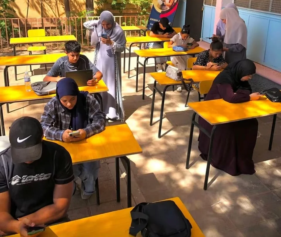 Students taking part in an outdoor academic challenge