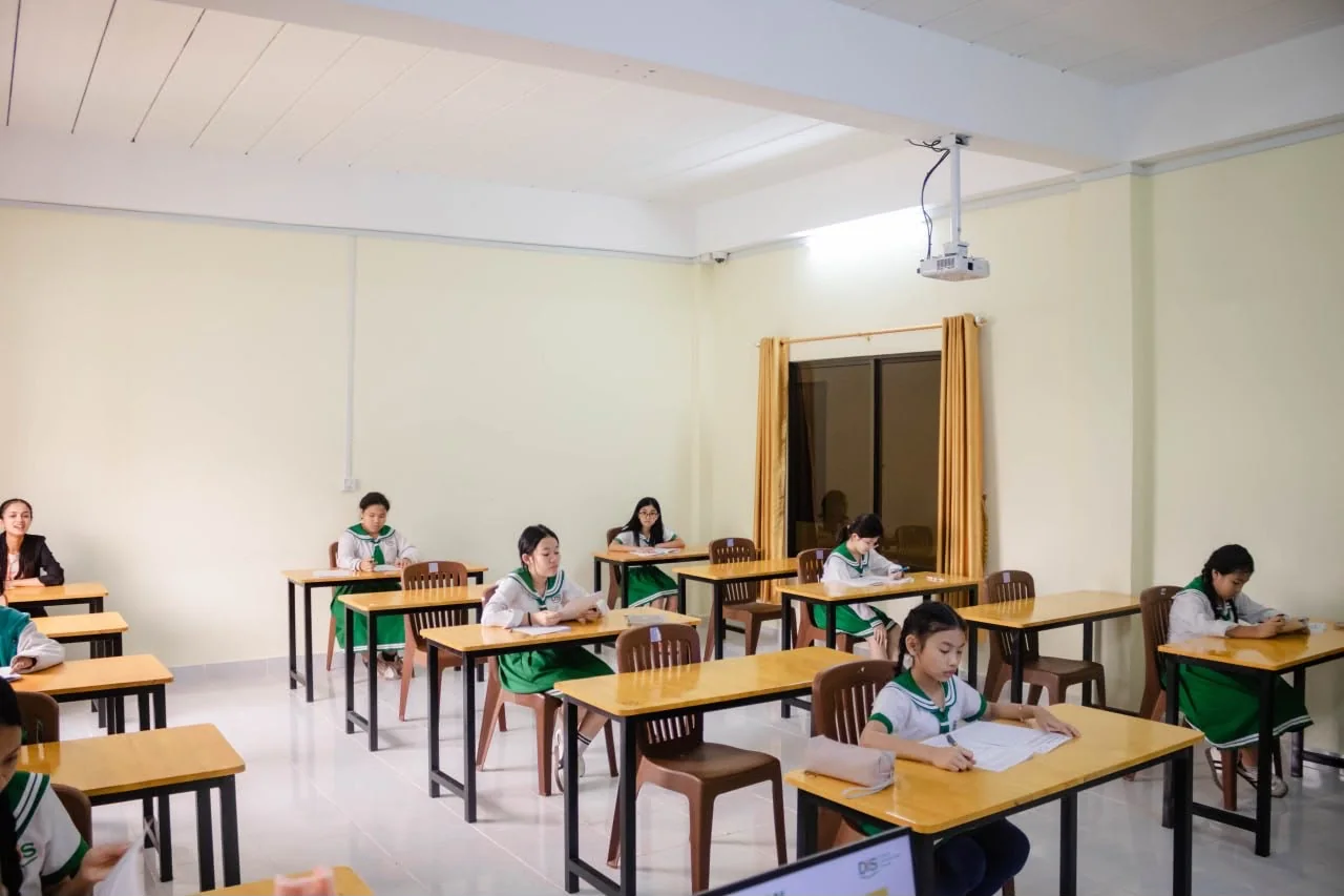Students working independently in an examination room